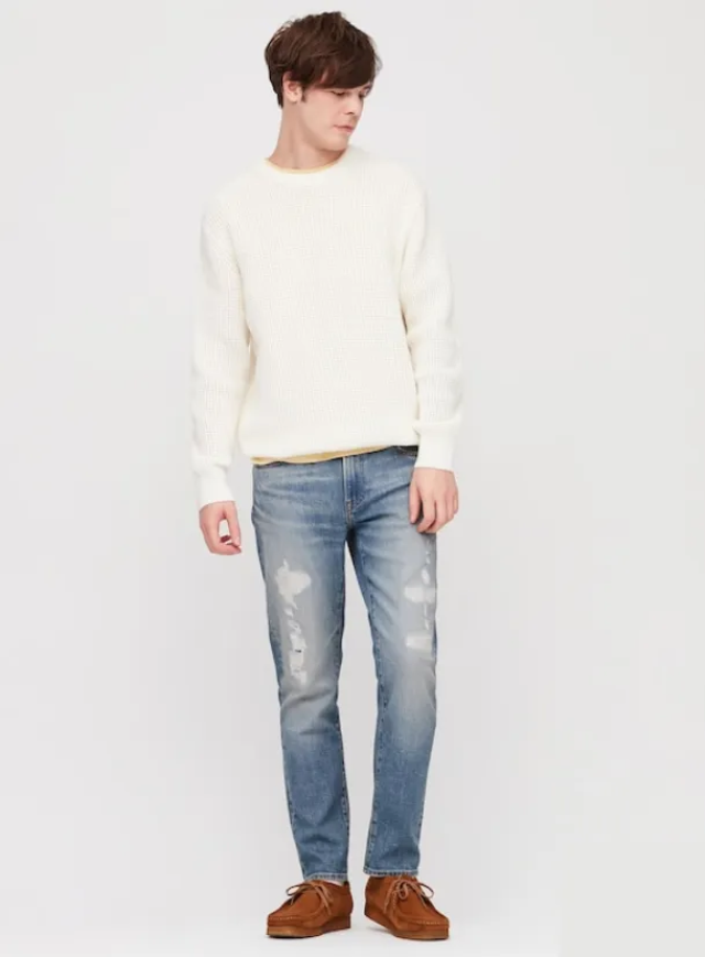 Brown casual shoes,  a white jumper,  and light blue jeans