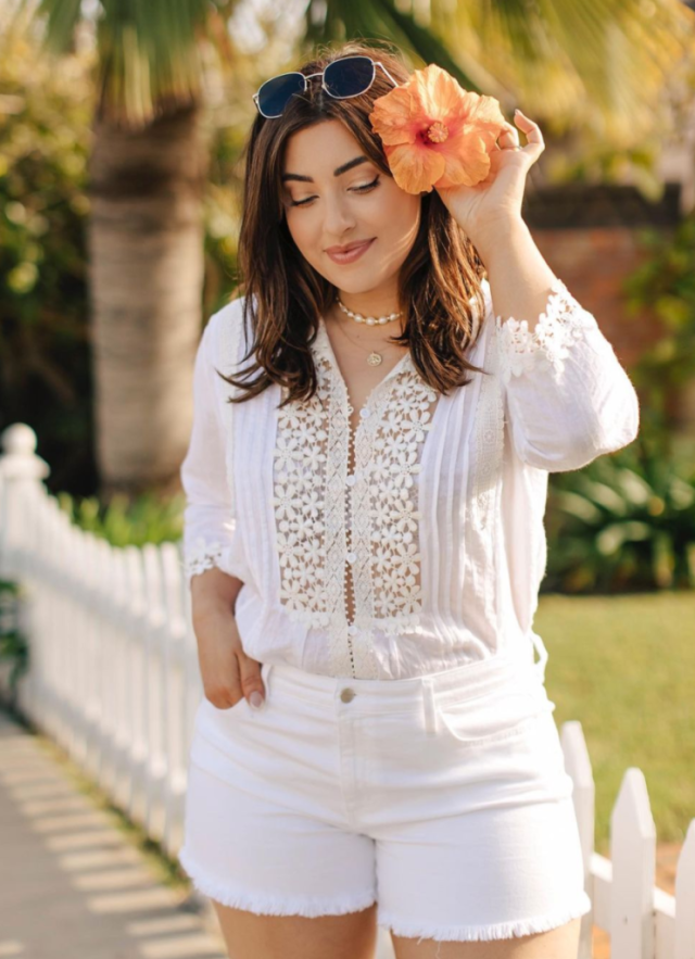 White blouse and white denim shorts