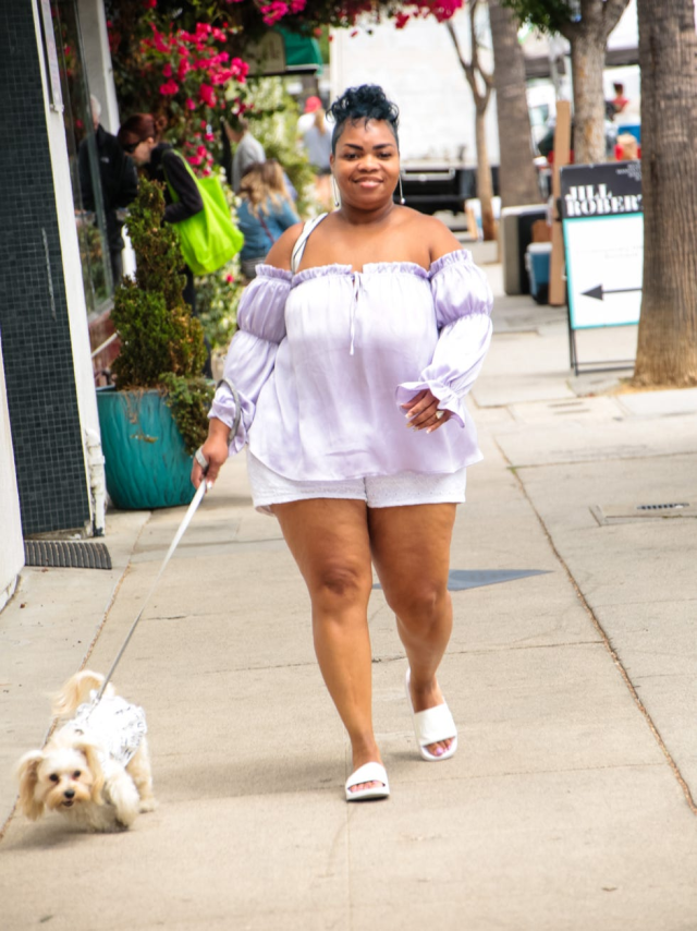 An off-the-shoulder top with white shorts