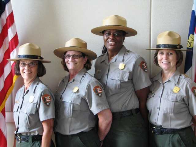  These hats are part of the classic National Park Service (NPS) ranger uniform 
