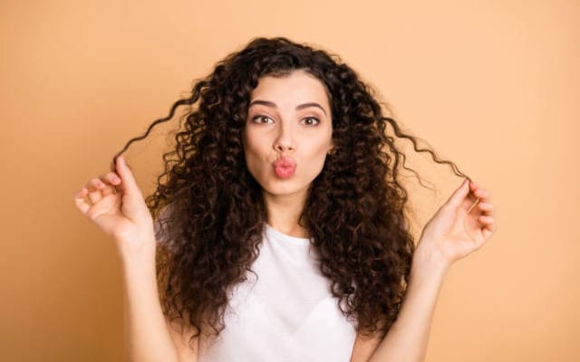 Try this 2024 hair trend - natural curly hair